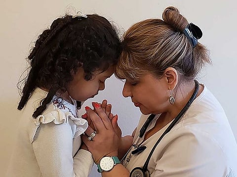 Katherine Ramos, right, with her 4-year-old daughter Victoria Ramos at their home in Patterson, N.Y. Ramos is one of an army of health care workers that heeded New York's call for help reinforcing hospitals overwhelmed by the coronavirus pandemic. Ramos, of Cape Coral, Florida, is staying with her family in Patterson while she works as a nurse at New York Presbyterian Hospital.