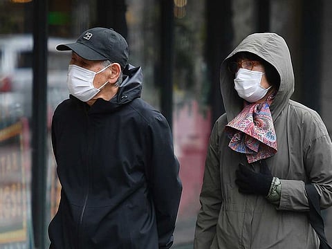 People wear face masks on April 03, 2020 in New York. In New York, the epicentre of the US outbreak, Mayor Bill de Blasio urged residents to cover their faces when outside and Vice-President Mike Pence said there would be a recommendation on the use of masks by the general public in the next few days