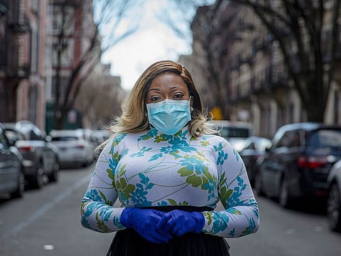 Tiffany Pinckney poses for a portrait in the Harlem neighborhood of New York. After a period of quarantine at home separated from her children, she has recovered from COVID-19. Pinckney became one of the nations first donors of "convalescent plasma."