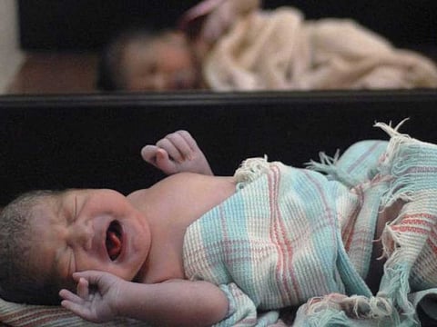 Newborn babies are shown at a hospital maternity ward in India, in this file photo from July 10, 2009.