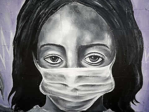 A painting by the graffiti artist Bandit titled Our Nurses, Our Saints is seen on a wall in the lower ninth ward in New Orleans, Louisiana, on April 03, 2020.