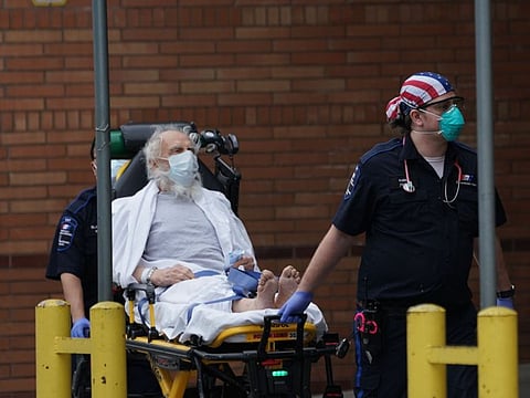 A patient arrives to Wyckoff Hospital in the Bushwick section of Brooklyn April 5 in New York.