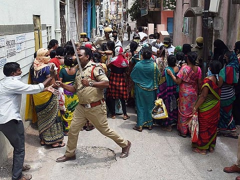 A policeman tries to disburse people who gathered without maintaining social distancing in Hyderabad during the nationwide lockdown earlier week. The herd immunity among the huge population, doctors hope, can slow down the coronavirus pandemic.