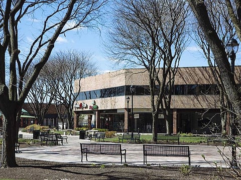 Benches sit empty at The Plaza at Harmon Meadow in Secaucus, New Jersey, US, on Thursday, April 2, 2020. Coronavirus is now enveloping New Jersey's suburbs and cities after ravaging New York City.