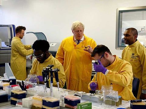 Britain's Prime Minister Boris Johnson visits a laboratory at the Public Health England National Infection Service in Colindale, north London, Britain, March 1, 2020.