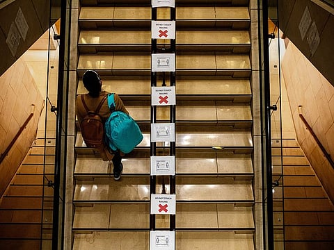 Social distancing signs are everywhere at the Four Seasons New York in Manhattan, April 4, 2020, which is now housing hospital workers battling the coronavirus pandemic. Although other hotels in the city are helping with hospital bed overflow, the Four Seasons has dedicated itself exclusively to keeping doctors, nurses and other medical professionals well rested and safe.