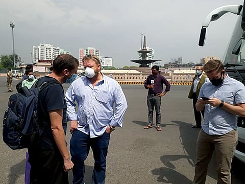 American Nationals board a bus which will be taking them to Delhi, from where they will be leaving for US, in Lucknow on Wednesday.