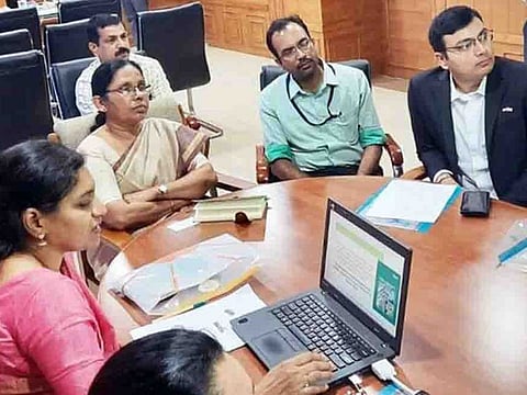 Kerala Health Minister K.K. Shailaja (second from left) holds a meeting with officials to discuss ways of tackling coronavirus.