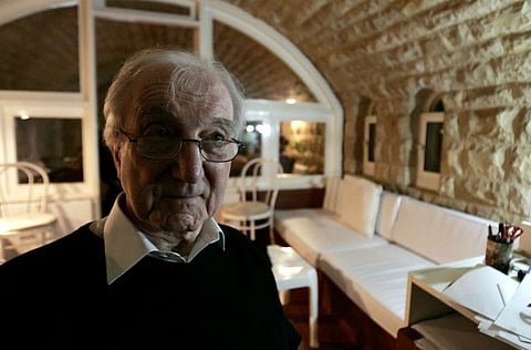 In this file photo taken on April 24, 2009, Iraqi architect Rifat Chadirji is pictured at his home office in the coastal Lebanese town of Halat. The "father" of Iraqi modern architecture, Rifat Chadirji, died late on April 10 in the United Kingdom after contracting the novel coronavirus, friends and Iraqi officials said.