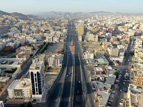 An aerial view shows deserted streets in Mecca. The buildings have been listed by an ad-hoc committee to be used as temporary accommodation sites across the kingdom.