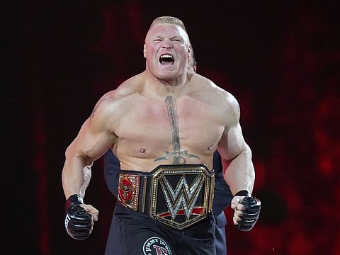 In this March 29, 2015, file photo, Brock Lesnar makes his entrance at Wrestlemania XXXI in Santa Clara, California.