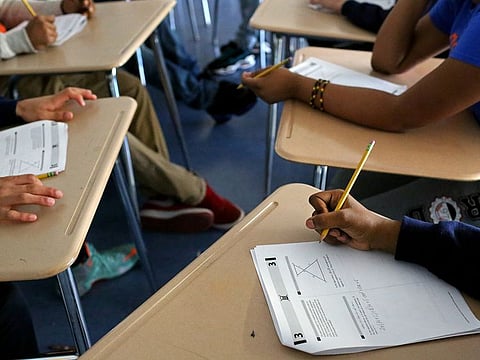 Students in an SAT preparation course in New York, March 1, 2016. The SAT and the ACT, standardized tests that serve as a gateway to college for millions of applicants each year, announced on April 15, 2020, that they would develop digital versions for students to take at home in the fall if the coronavirus pandemic continues to require social distancing.