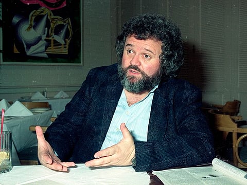 This 1990 file photo shows director of photography Allen Daviau speaking during an interview in Los Angeles. Daviau, who shot three of Steven Spielberg’s films including “E.T. The Extra-Terrestrial,” died Tuesday, April 14, 2020 at age 77.