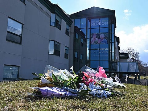 Flowers outside the Herron private nursing home in Dorval, west of Montreal, on April 16, 2020. The discovery of 31 deaths at Montreal's Herron nursing home has prompted an investigation into alleged gross negligence after caregivers fled amid a coronavirus outbreak.