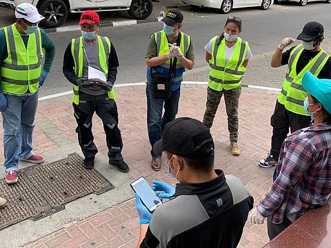 Volunteers gather in Dubai amid the coronavirus pandemic