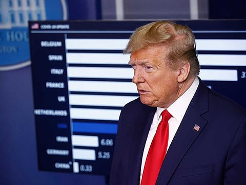 US President Donald Trump listens during a coronavirus task force briefing at the White House in Washington on April 18, 2020.