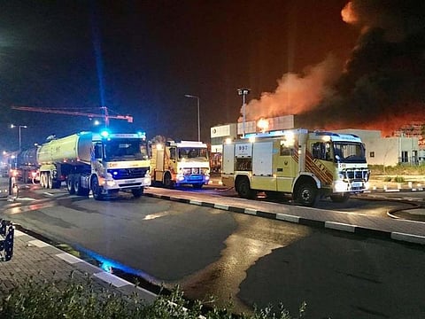 Dubai Civil Defence teams at the scene of the fire in Jebel Ali.