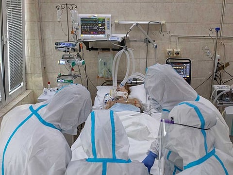 Medical workers treat a patient suffering from the coronavirus disease (COVID-19) inside the Intensive Care Unit at the Hospital for Infectious and Tropical Diseases of the Clinical Center of Serbia in Belgrade, Serbia, April 24, 2020.