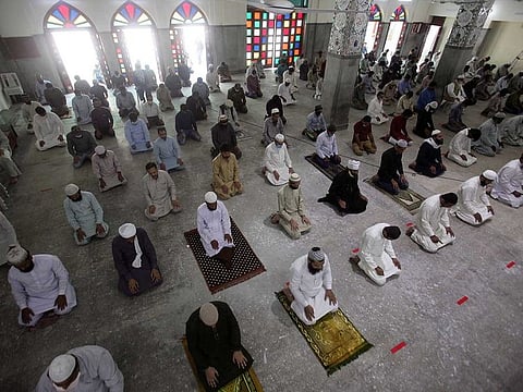 Worshippers maintain safe distance as they attend Friday congregational prayers in Lahore, Pakistan (File)