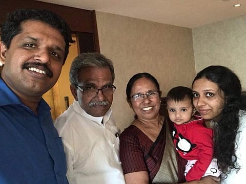 Left to right: UAE-based engineer Sobhith KK with his dad K Bhaskaran, mum KK Shailaja, daughter Niral and wife Sinju