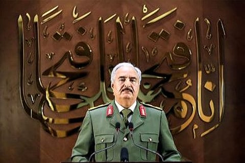This image grab taken from a video published by the War Information Division of military strongman Khalifa Haftar's Libyan National Army on April 28 shows Haftar giving a speech.