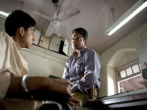 Irrfan Khan in Slumdog Millionaire