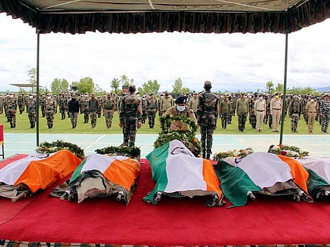 Indian Army pays tribute to troops who were killed during a shootout in Kashmir, in Handwara on Sunday.