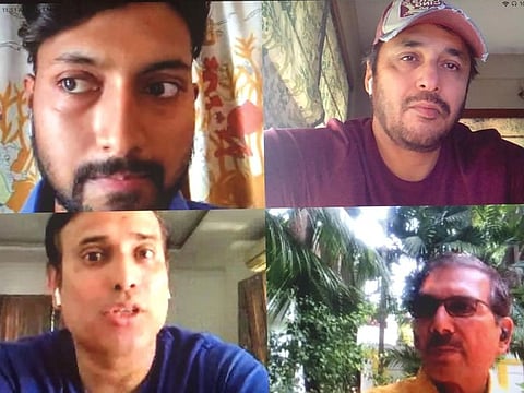 VVS Laxman (below left) makes his point to Bengal batsman Agniv Pan as Joydeep Mukherjee (top right) and Arun Lal join in the conversation.