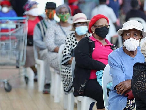 Customers sit on chairs at Maponya Mall as South Africa starts to relax some aspects of a stringent nationwide lockdown due to the coronavirus disease (COVID-19) outbreak in Johannesburg, South Africa, May 5, 2020.
