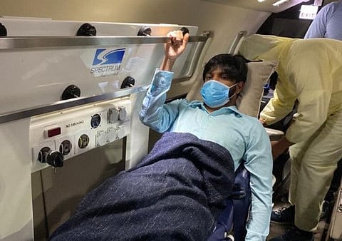 Dileep Sabreesh, 30, being flown on the air ambulance on Tuesday night