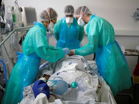 A patient suffering from the coronavirus disease (COVID-19) is treated in the Intensive Care Unit (ICU) at the hospital in Vannes during the outbreak of the coronavirus disease in France, May 6, 2020.