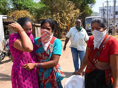 Residents return back to RR Venkatapuram village, a day after the major chemical gas leak incident at LG Polymers plant, in RR Venkatapuram village in Visakhapatnam, Friday, May 8, 2020.