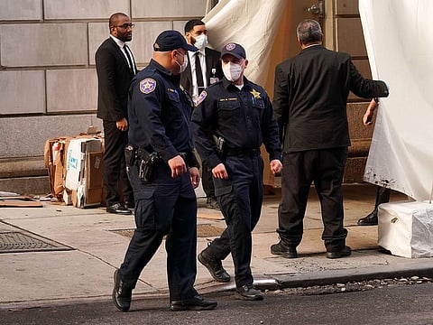 Officers exit the makeshift morgue at Lenox Hill Hospital before escorting the body of Glen Ridge New Jersey police officer Charles Roberts on May 11, 2020 in New York City.
