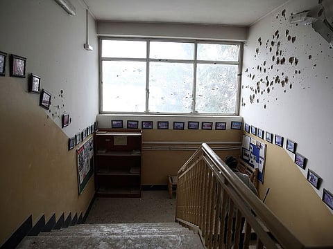 A bullet holes line the wall of a maternity hospital, in Kabul, Afghanistan, Tuesday, May 12, 2020.