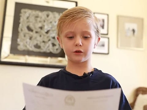 Archie reading the return letter from Sheikh Saud.