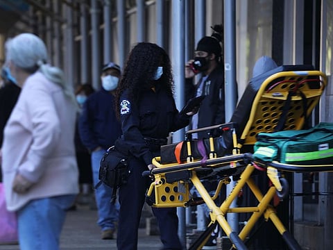 edics take a stretcher into a Manhattan hospital that has been at the forefront of the coronavirus outbreak on May 12, 2020 in New York City.