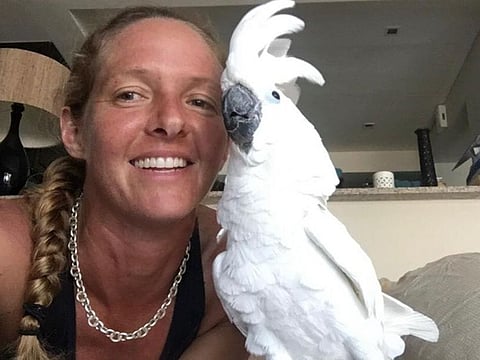 Lisa Hancox with parrot Charlie