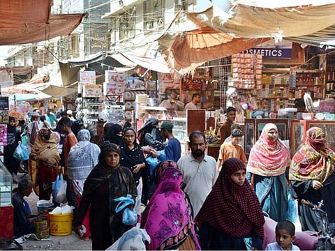 Public throng the markets and bazaars for shopping in Karachi ignoring the government's instructions to prevent COVID-19 spread after the lockdown was eased.