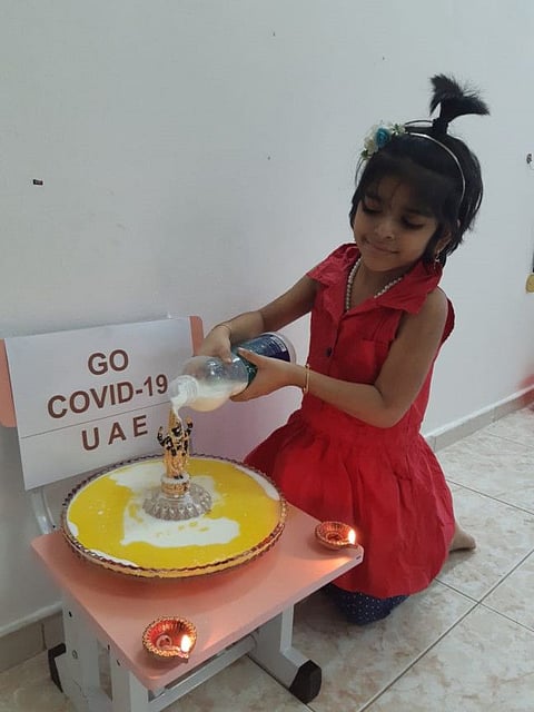 Little Chirasvi Mukku and her father offered special prayers for an early end to the pandemic at their home