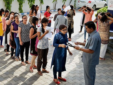 Jabalpur: Candidates being checked before appearing for the NEET exam in Jabalpur