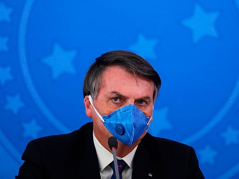 Brazil's President Jair Bolsonaro during a press conference on the coronavirus pandemic COVID-19 at the Planalto Palace in Brasilia