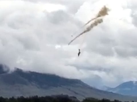 A plane of the Canadian Air Force's Snowbirds aerobatic demonstration team is seen prior crashing in Kamloops, British Columbia, Canada May 17, 2020, in this still image obtained from a social media video.