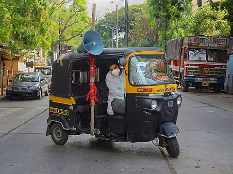 Akshay Kothawale, an auto-rickshaw driver, uses the money saved for his marriage ceremony to feed the needy during the ongoing COVID-19 nationwide lockdown, in Pune, Monday, May 18, 2020.
