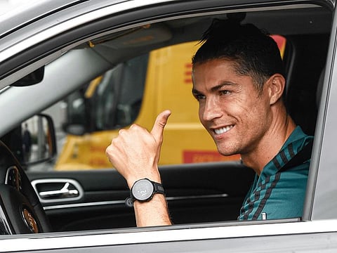 Cristiano Ronaldo leaves the Juventus sport centre after his first training session in Turin on Monday since the lockdown from March due to the coronavirus pandemic.