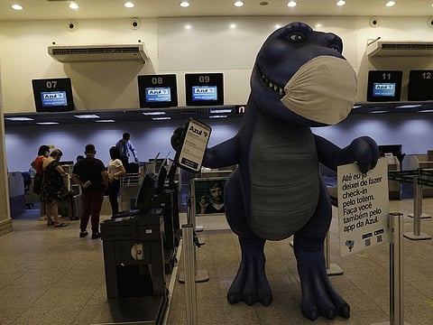 Passengers check-in at Azul Airlines counters in Santos Dumont airport during the coronavirus disease (COVID-19) outbreak in Rio de Janeiro, Brazil, May 20, 2020.