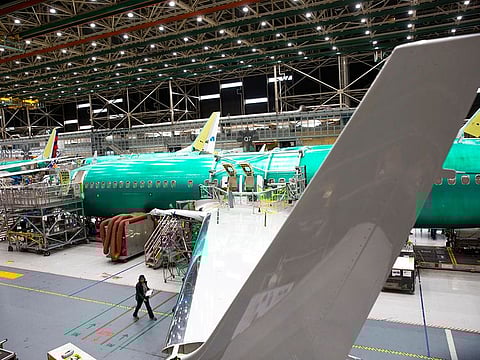 On March 27, 2019, employees work on Boeing 737 Max airplanes at the Boeing Renton Factory in Renton, Washington.