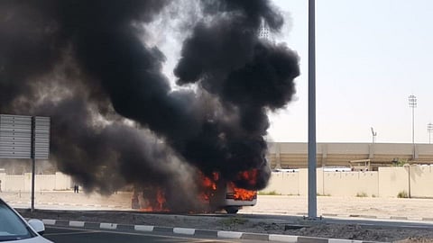 The bus that caught fire near Latifa Hospital in Dubai on Thursday morning.