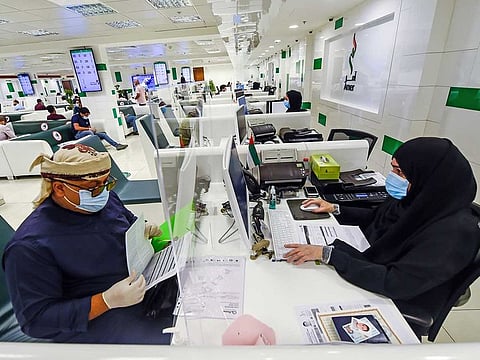 Visitors at the Amer Centre in Al Twar, Dubai.