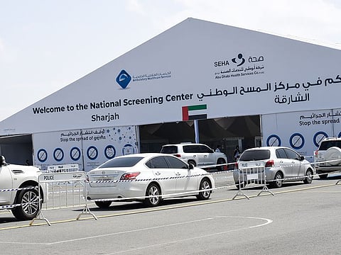 Vehicles lined up at the SEHA drive through National Screening Center at Golf and Shooting club in Sharjah. Seha has announced that children aged 12 and above can now get COVID-19 vaccines at all Seha Centres in the UAE.
