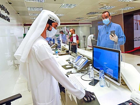 The Federal Authority for Human Resources said federal government employees that break preventive measures against COVID-19 may face up to a three-day salary cut for repeated violations. For illustrative purposes only.